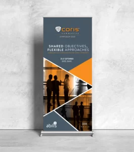 Coris 2023 Symposium gray and orange floor pullout banner.